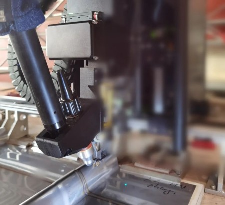 十一所成功研發(fā)國內(nèi)首套波紋板全位置自動焊機